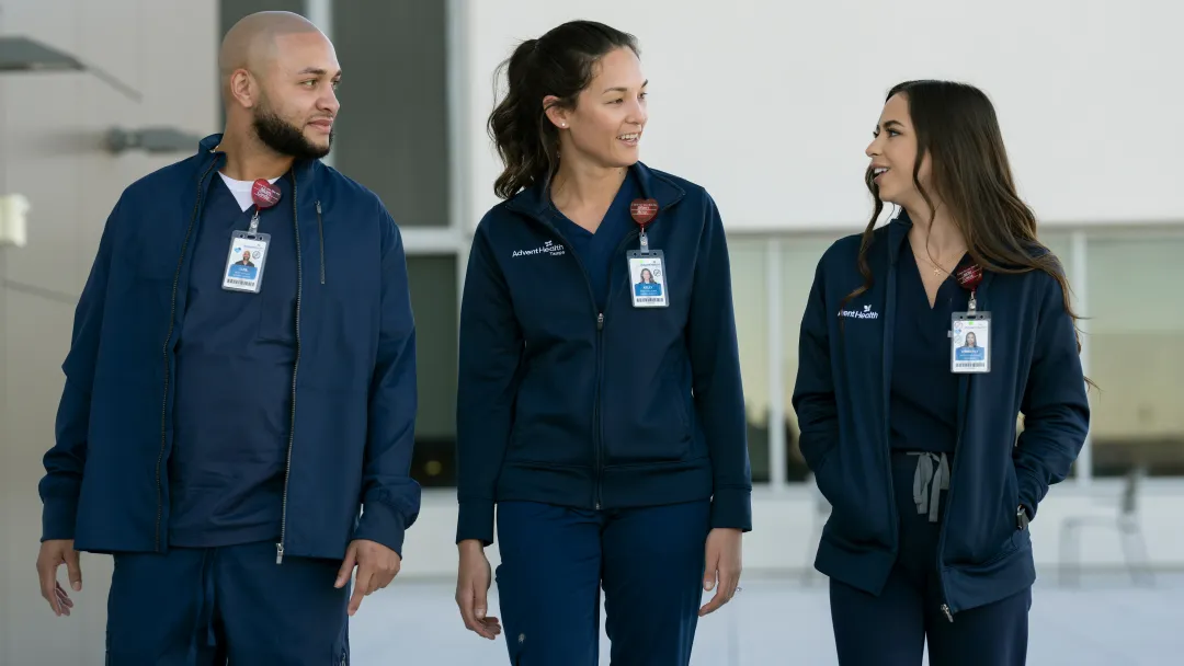 3 AdventHealth Team Members walking together 