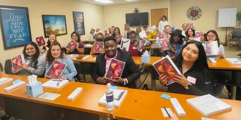 AHU Denver nursing students receive their iPads in May 2022.